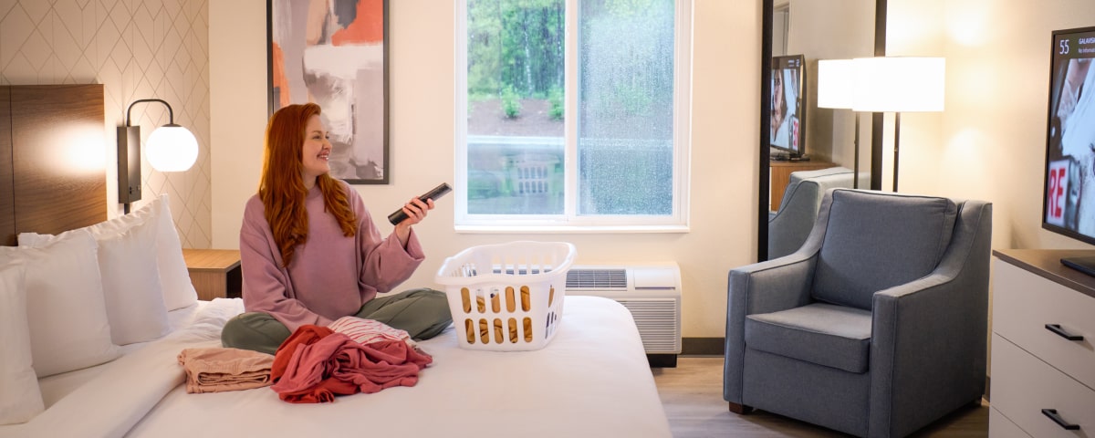 Guest Enjoying Extended Stay Hotel Accomedations