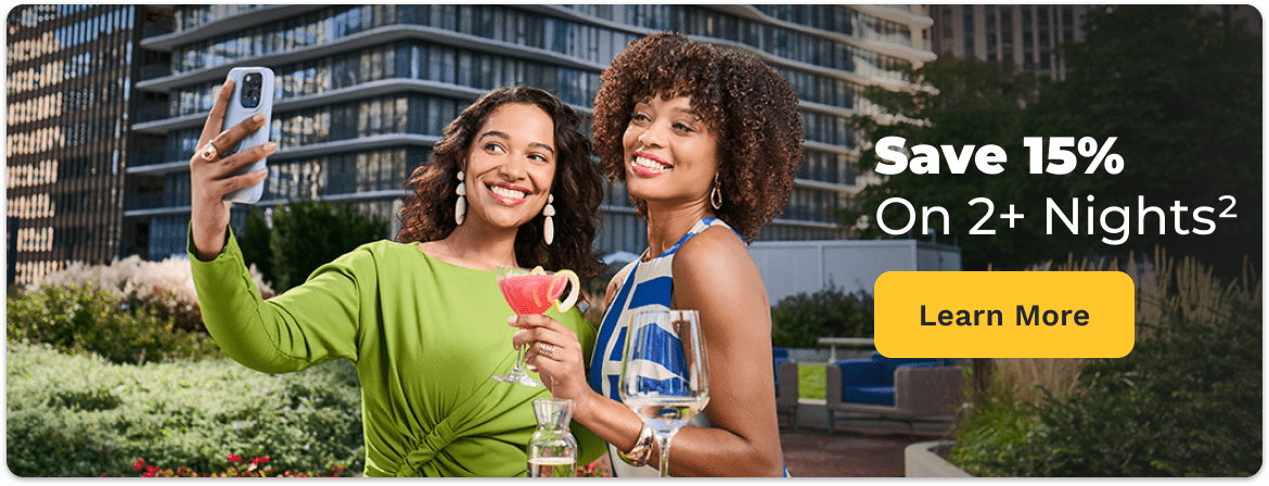 Ladies Taking a Selfie - Save 15% On 2+ Nights** - Learn More