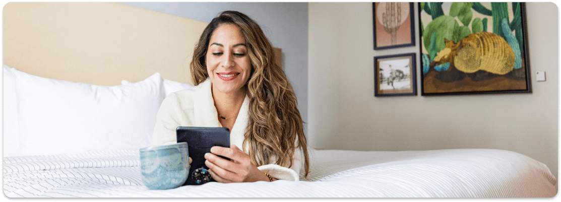 Image of Hotel Guest Enjoying Stay - Save up to 20% with AAA